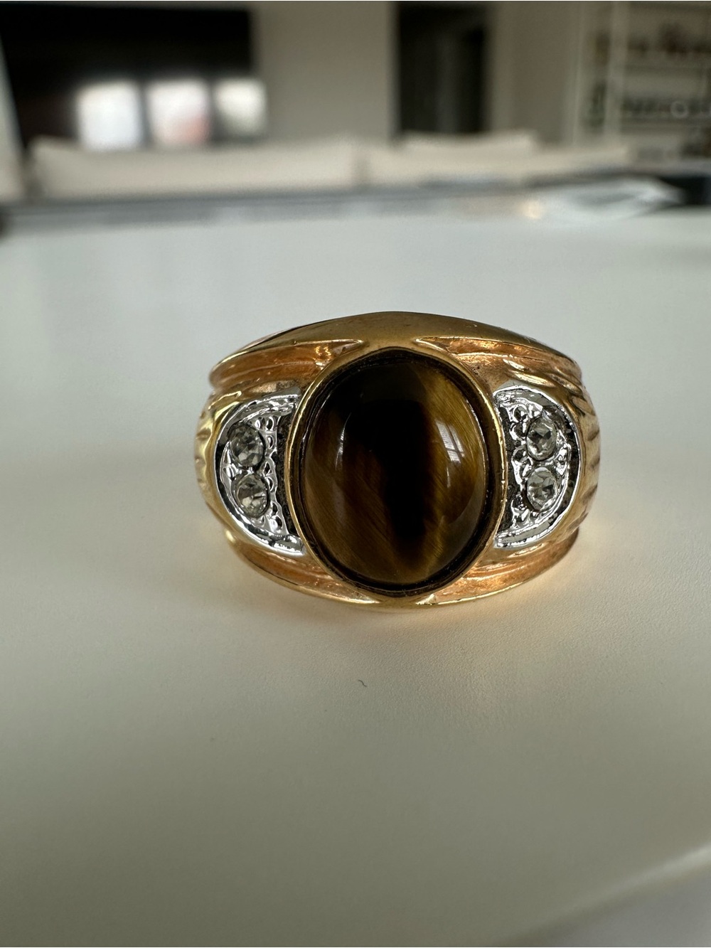 Gold Tone Ring with Brown Tiger's Eye Center and Clear Accent Stones